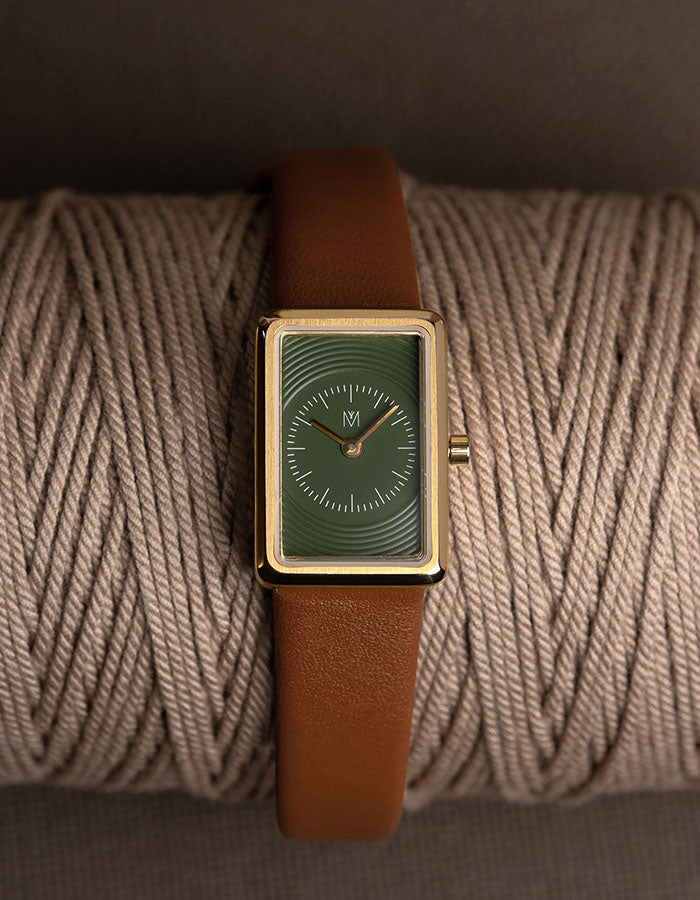 Elegant sapphire dial lather watch